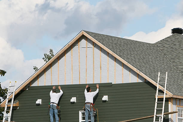 Professional Siding Replacement technician working in Wingate, MD